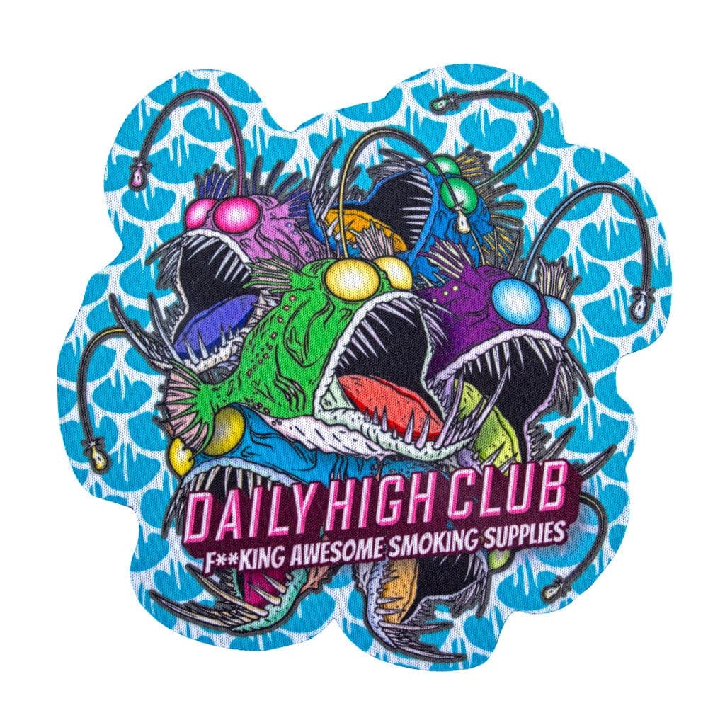 A detailed illustration of the Daily High Club Angler Fish Glass Mat, showcasing a vibrant, cartoonish deep-sea fish design.