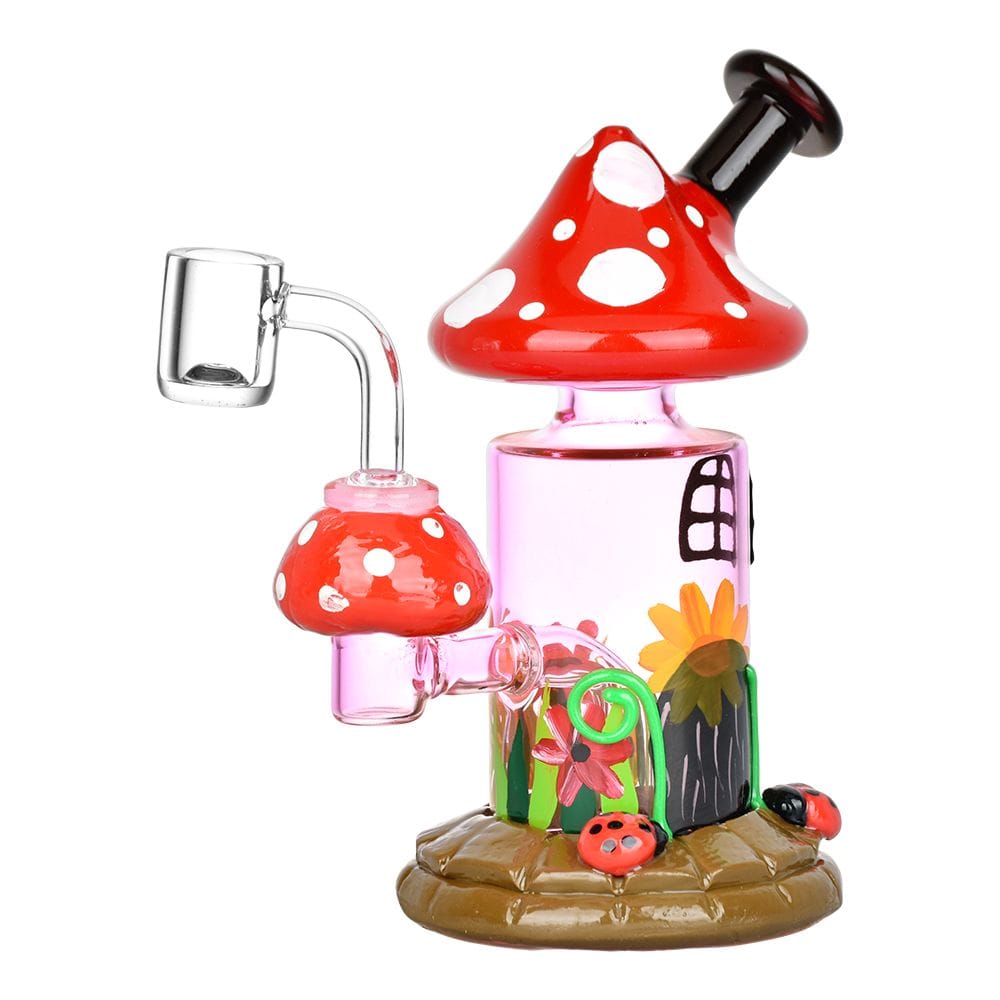The Magic Shroom Garden Glow In The Dark Glass Dab Rig is displayed from a low angle, showcasing its mushroom-shaped form and intricate glasswork.