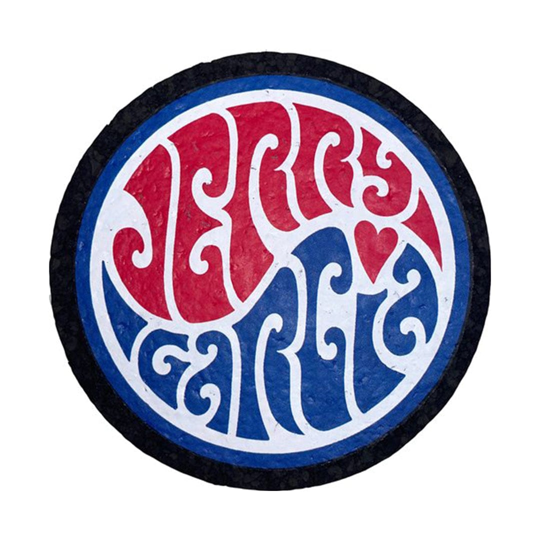 Close-up of the "5" Dab Mats, featuring a circular design with layered, colorful lettering against a dark background.