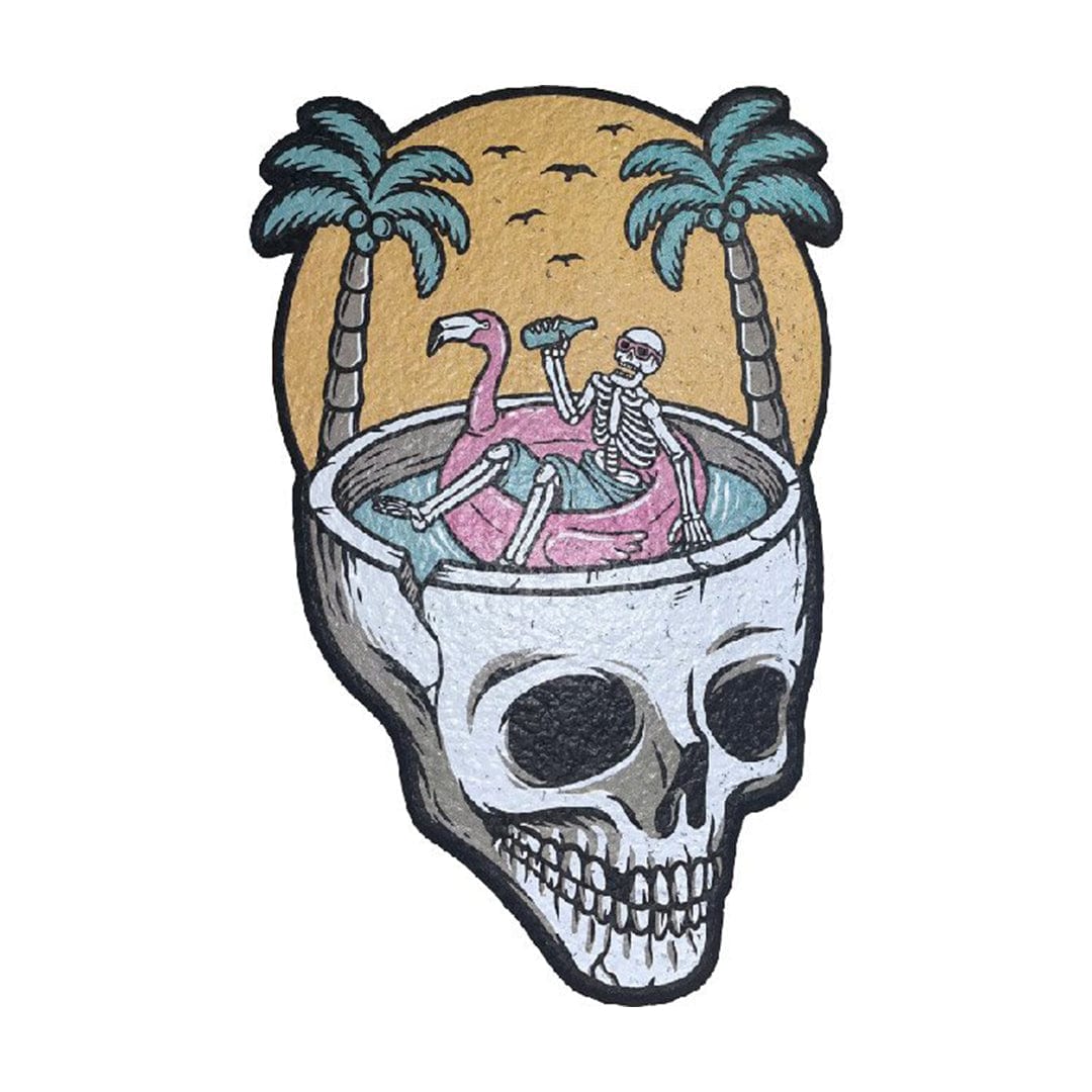A whimsical illustration features the "11" Dab Mats design with a tropical scene inside a skull’s open mouth.