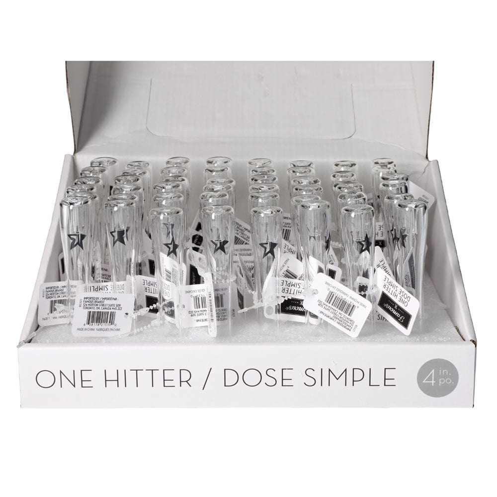 A full-box view of the Famous X Clear One Hitter Hand Pipes, showcasing many clear glass one-hitters neatly arranged inside.