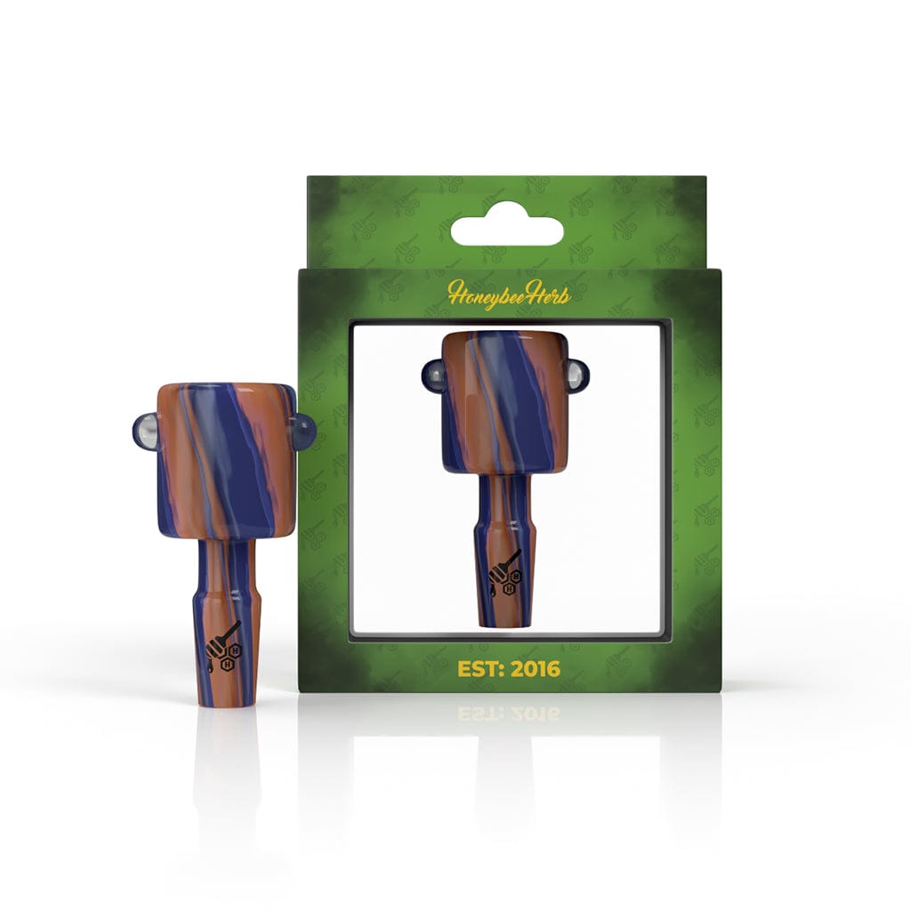 Front view of the COLOR SPLASH FLOWER BOWL, a vibrant glass piece with colorful splashes displayed on a black surface.