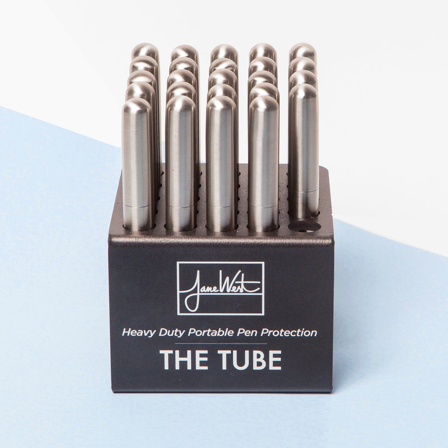 Front view of The Tube, a sleek, cylindrical glass piece with a minimalist design and a smooth, polished surface.