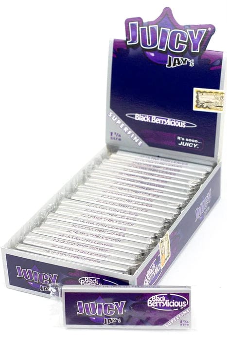 A close-up, angled view of Super Fine Rolling Papers stacked neatly within its branded packaging.