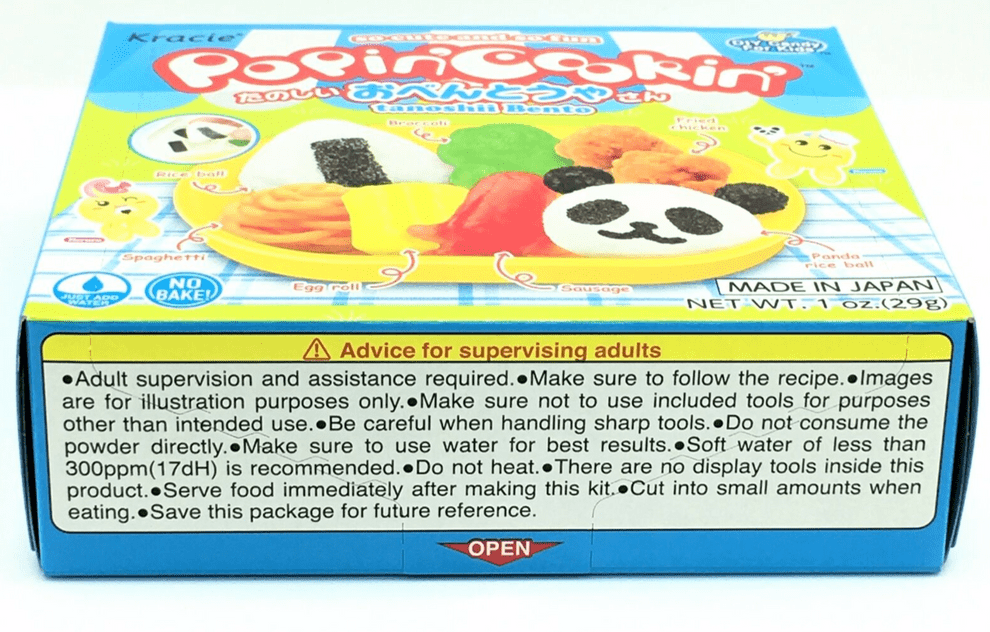Front view of the “DIY Candy Making Kit - Tanoshii Bento” package displaying colorful, cartoon food illustrations on a light blue background.
