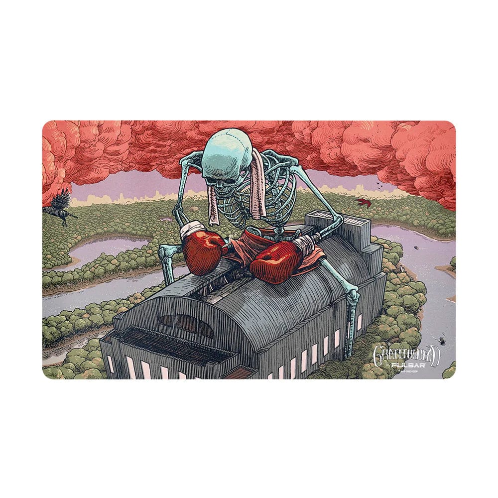 A detailed illustration on the Grateful Dead x Pulsar DabPadz, showing a skeleton reclining on a patterned surface with swirling smoke.