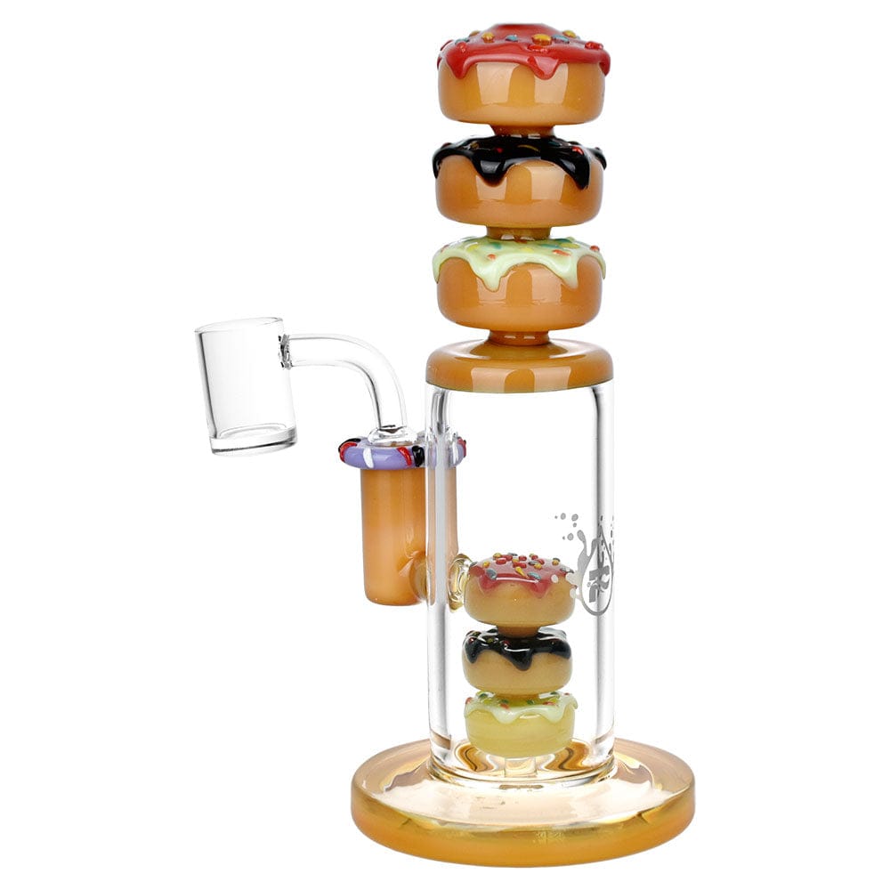 A side view of the Pulsar Donuts Upon Donuts Rig displays a stacked, colorful glass rig resembling donuts.