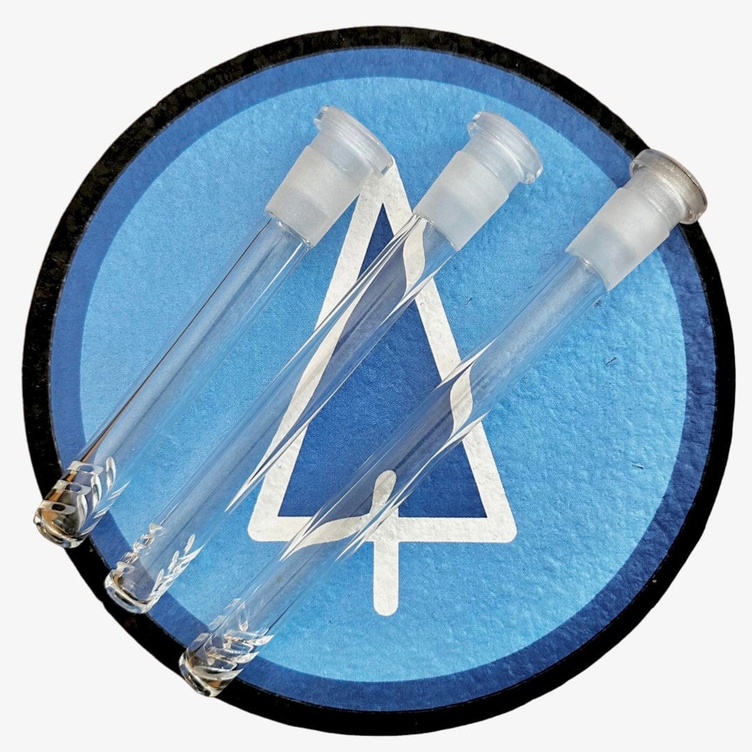 A close-up view of the Glass Downstem showing its clear glass construction and downward angled form.