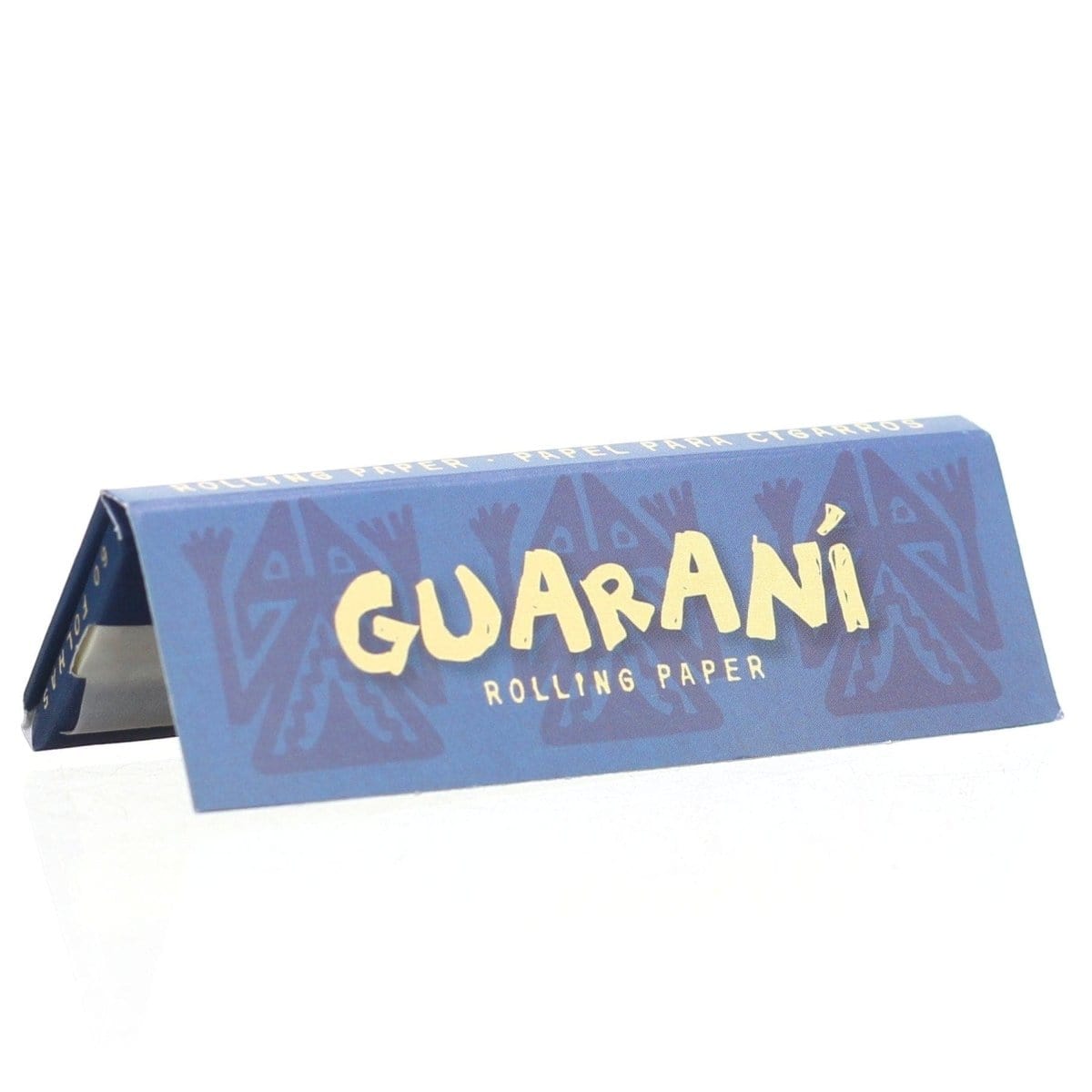 A close-up, angled shot of Guarani Rolling Papers, displaying patterned packaging and text in blue and white.