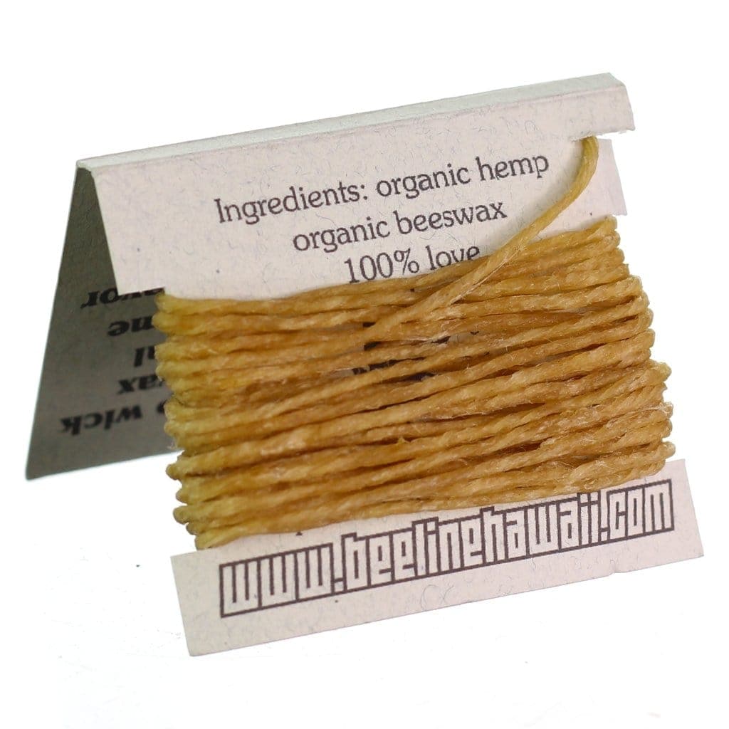 A close-up of Bee Line Hemp Wick spooled and packaged, highlighting the natural fiber texture and labeling details.