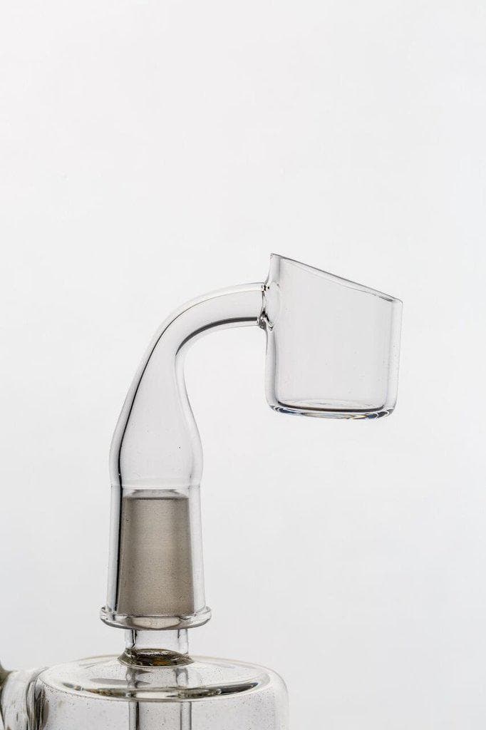 A close-up, angled view of the 14mm Quartz Banger, showcasing its clear quartz construction and shallow dish.