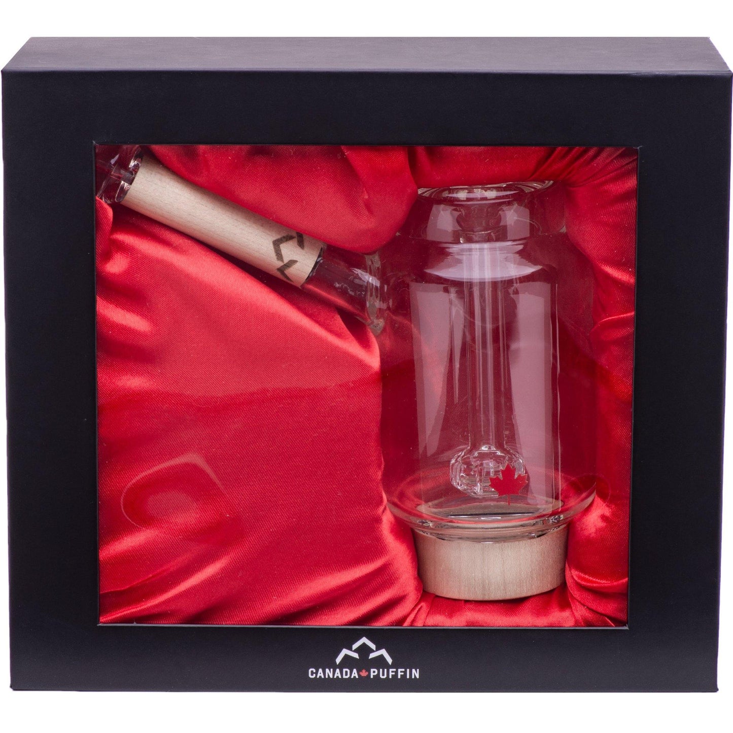 A side view of the Arctic Bubbler, showcasing its clear glass construction against a rich red background.