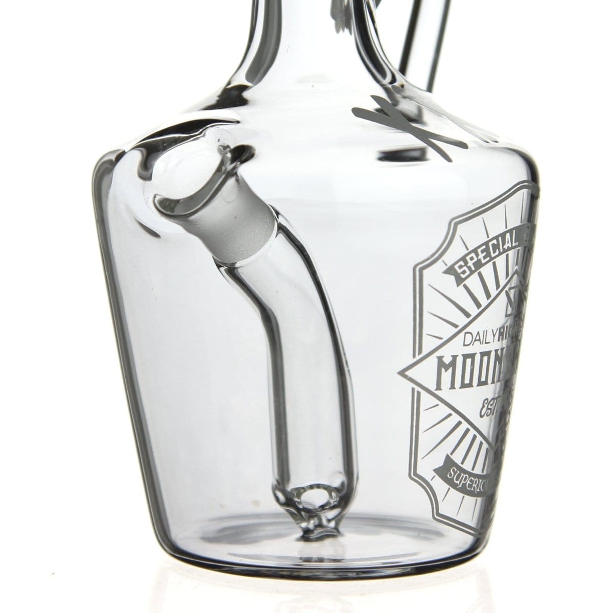 A studio shot of the DHC Originals "Moonshine Jug" Bong, showcasing its clear glass jug shape and detailed neck design.