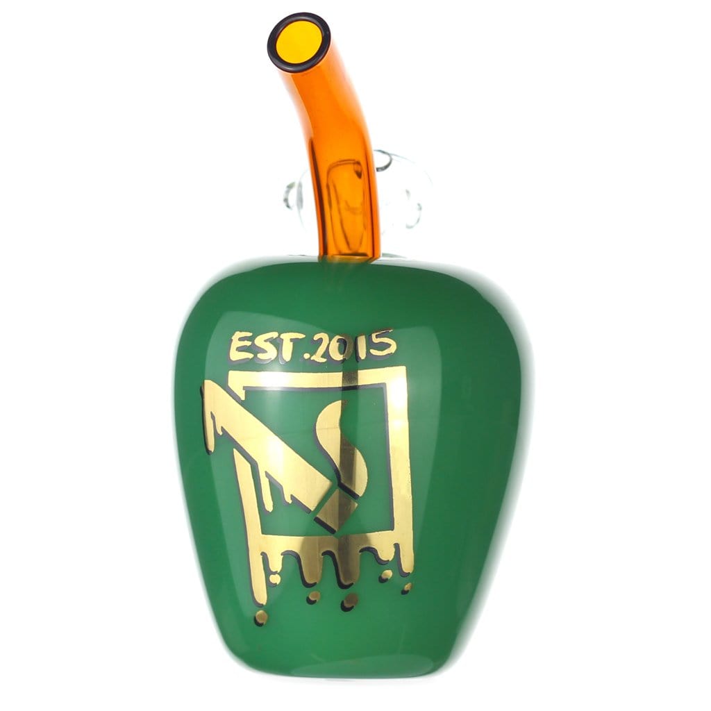 A studio shot of the DHC Originals "Poisonous Apple" Bong, featuring a green, apple-shaped glass piece with a curved neck.