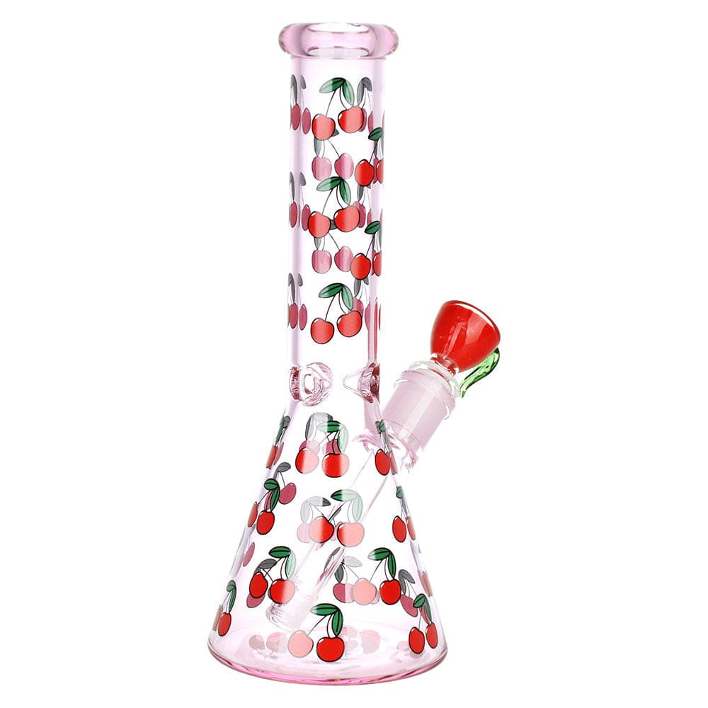 Front view of the 10-inch “Life Is A Bowl Of Cherries” beaker water pipe, displaying a pink glass body with red cherry patterns.