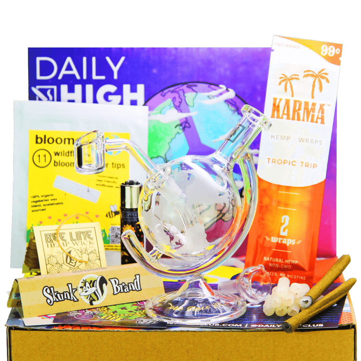 A high-angle shot of the "World Peace" Smoking Box, with a glass piece surrounded by branded packaging and rolling papers on a dark surface.