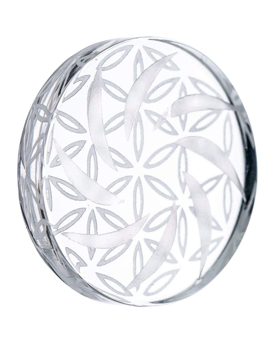 Front view of the “Mandala Disk” Channel Carb Cap, a clear glass disk with a circular, patterned design.