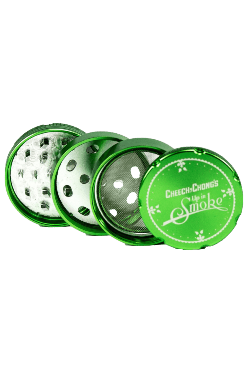 The Famous X $30 Kit is shown as a disassembled, four-piece grinder with a metallic finish in a top-down studio shot.