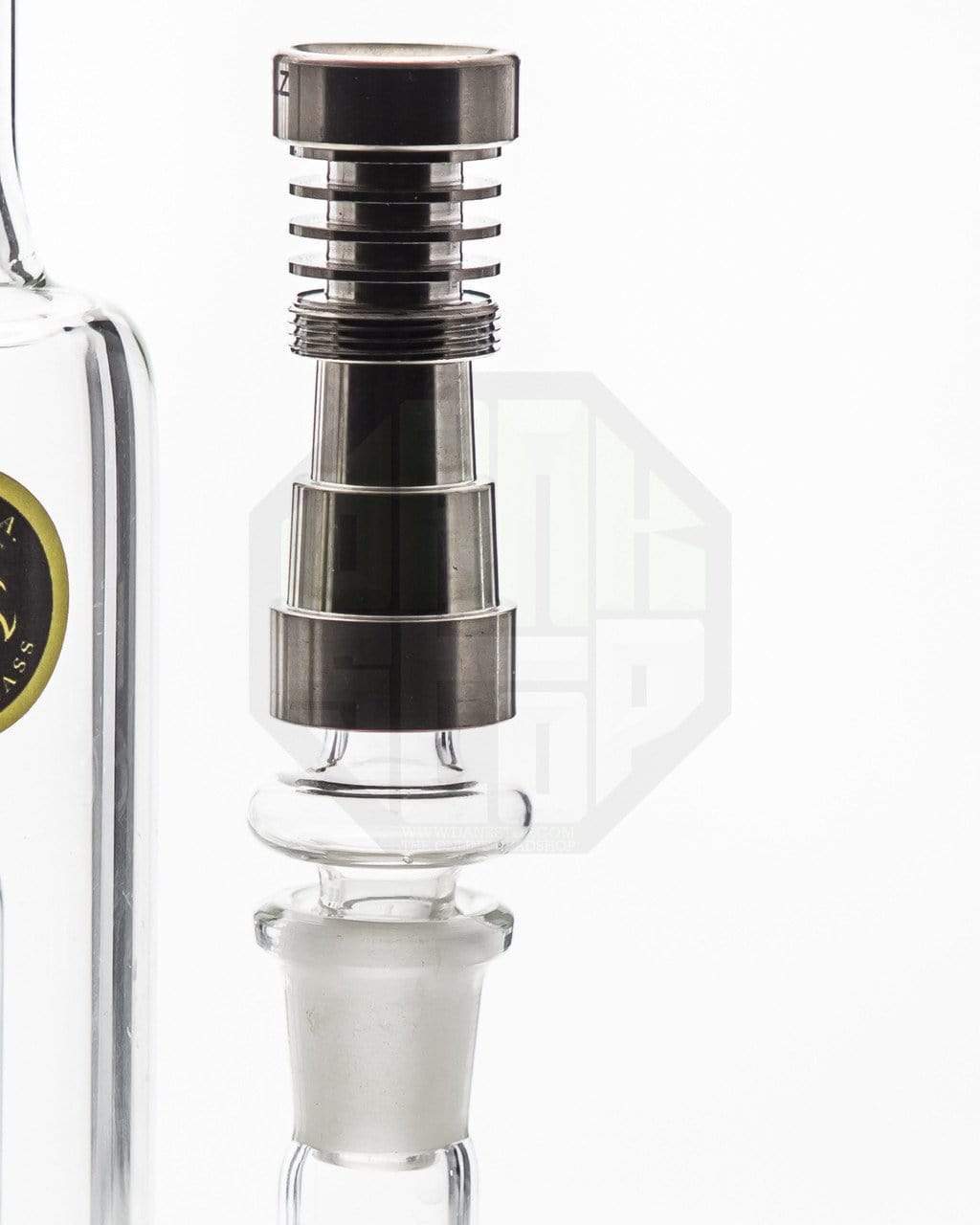 Close-up of the Male to Male Glass Adapter, showing a clear glass connection between two cylindrical forms.