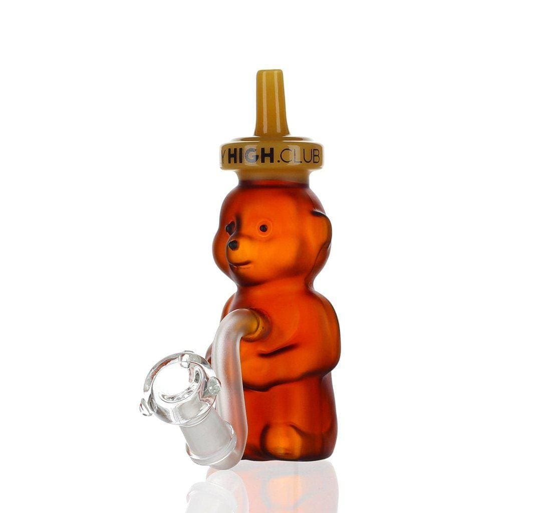 A studio shot of the Daily High Club "Brown Honey Bear" Bong, showcasing its glossy brown finish and whimsical bear shape.