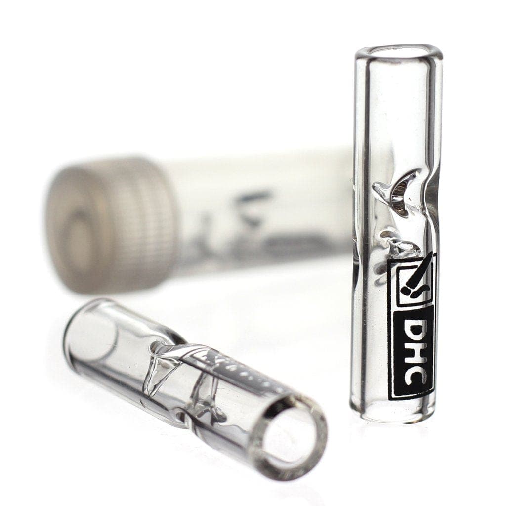 A close-up of the DHC Originals Glass Filter Tip, showcasing its clear glass construction and cylindrical shape against a neutral background.