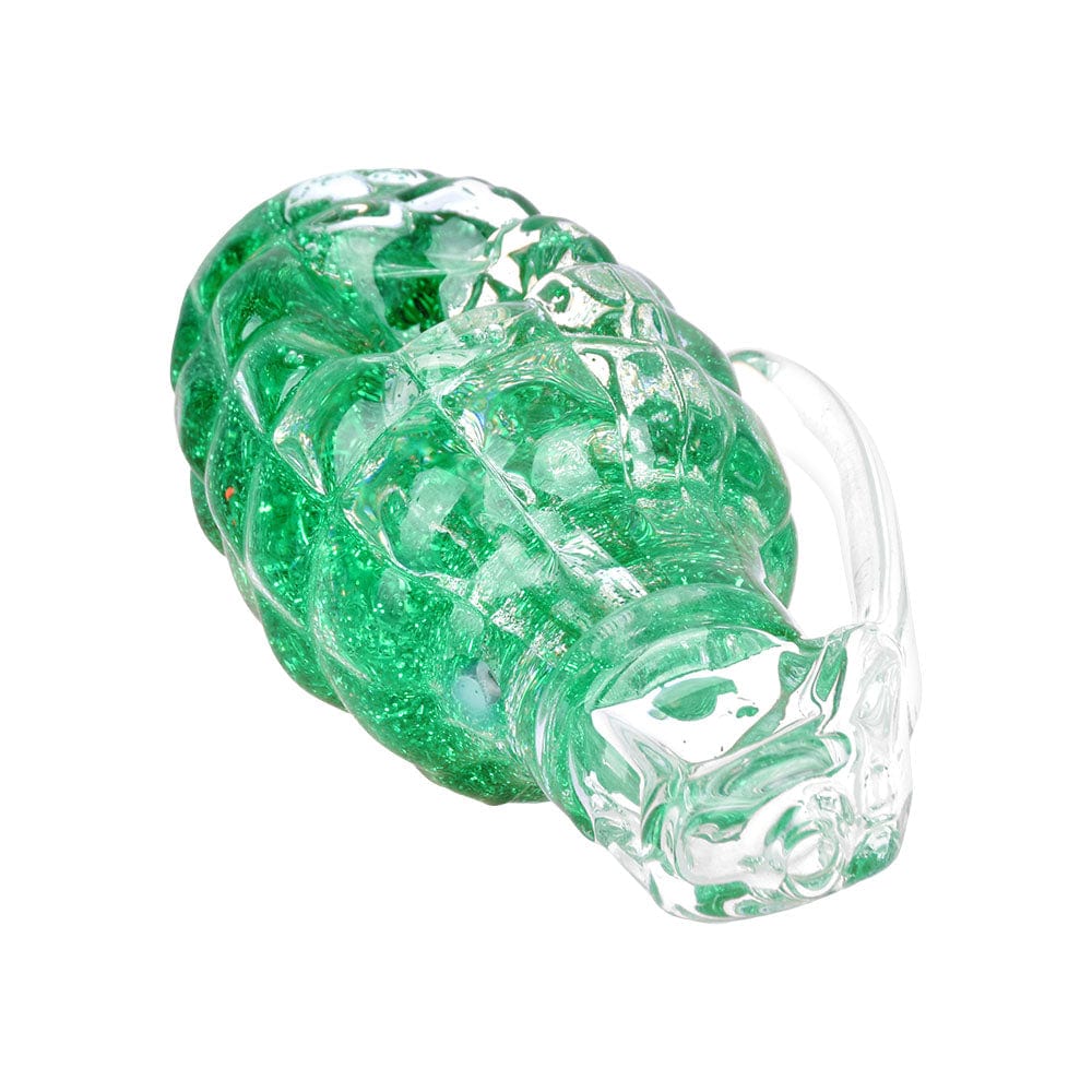 A close-up, angled view of the Glitter Grenade 3.5" Glycerin Glass Hand Pipe, showcasing its vibrant, speckled green glass.