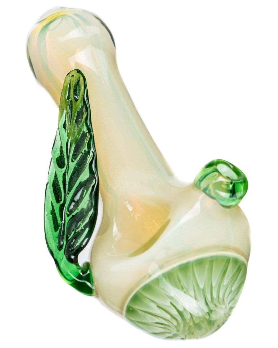 A side view of the Leafy Green Mushroom Milli Spoon Pipe, showcasing its green-tinted glass and rounded bowl design.