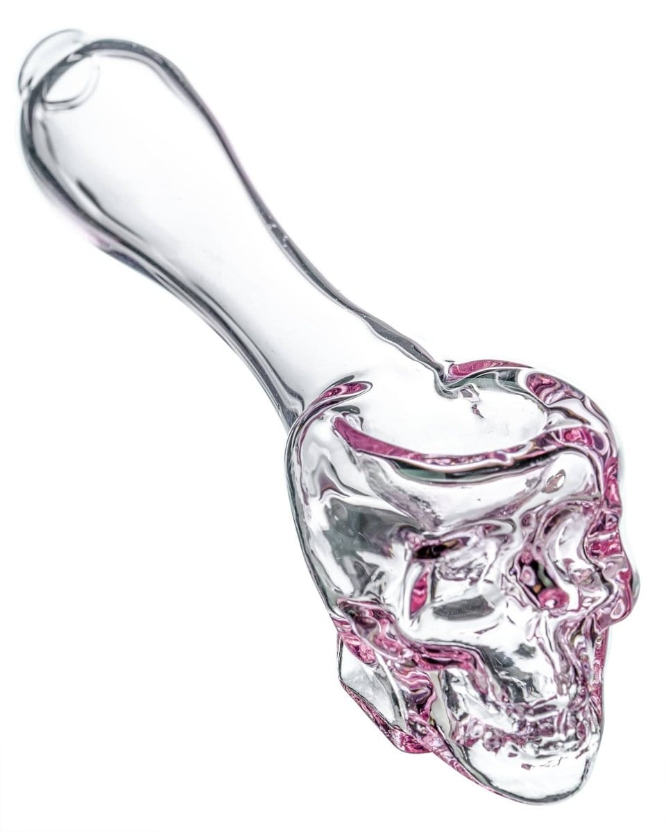 A side view of the Skull Mini Spoon Pipe, showing the detailed skull design in clear glass.