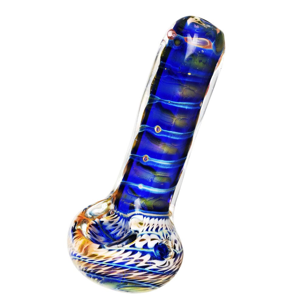 A close-up, angled view of the Desert At Night Glass Spoon Pipe, featuring colorful swirls within the glass.