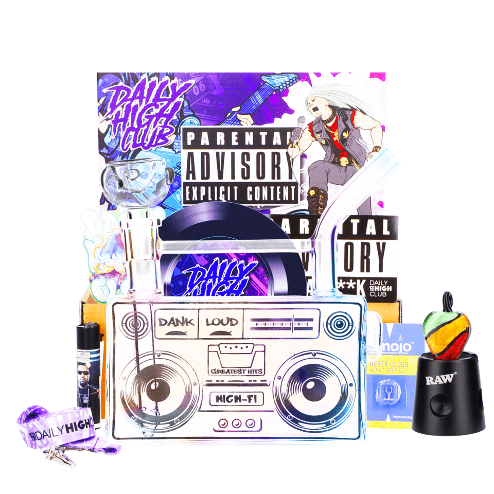 A high-angle shot features the “Ready to Rock” Smoking Box alongside music-themed packaging and vibrant graphics.