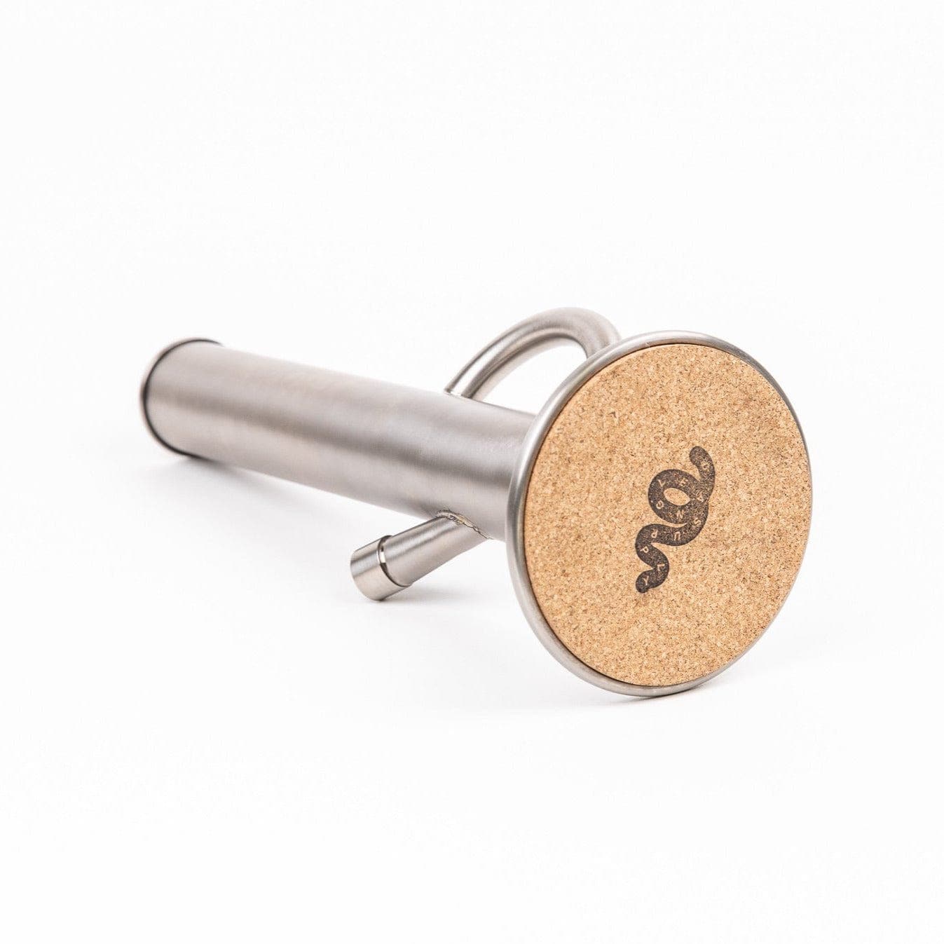 A close-up, angled view of the titanium joint on the Big Ripper Titanium Water Pipe by Dangle Supply.