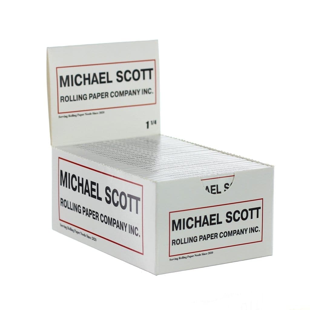 A stack of Michael Scott Paper Company 1 1/4 Rolling Papers is shown in a close-up, angled shot against a plain white background.