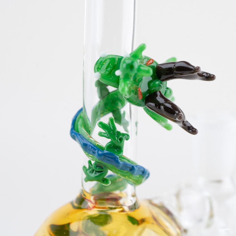 A close-up, angled view of the Dragon Sphere Mini-Tube with a colorful, textured glass base and clear upper portion.