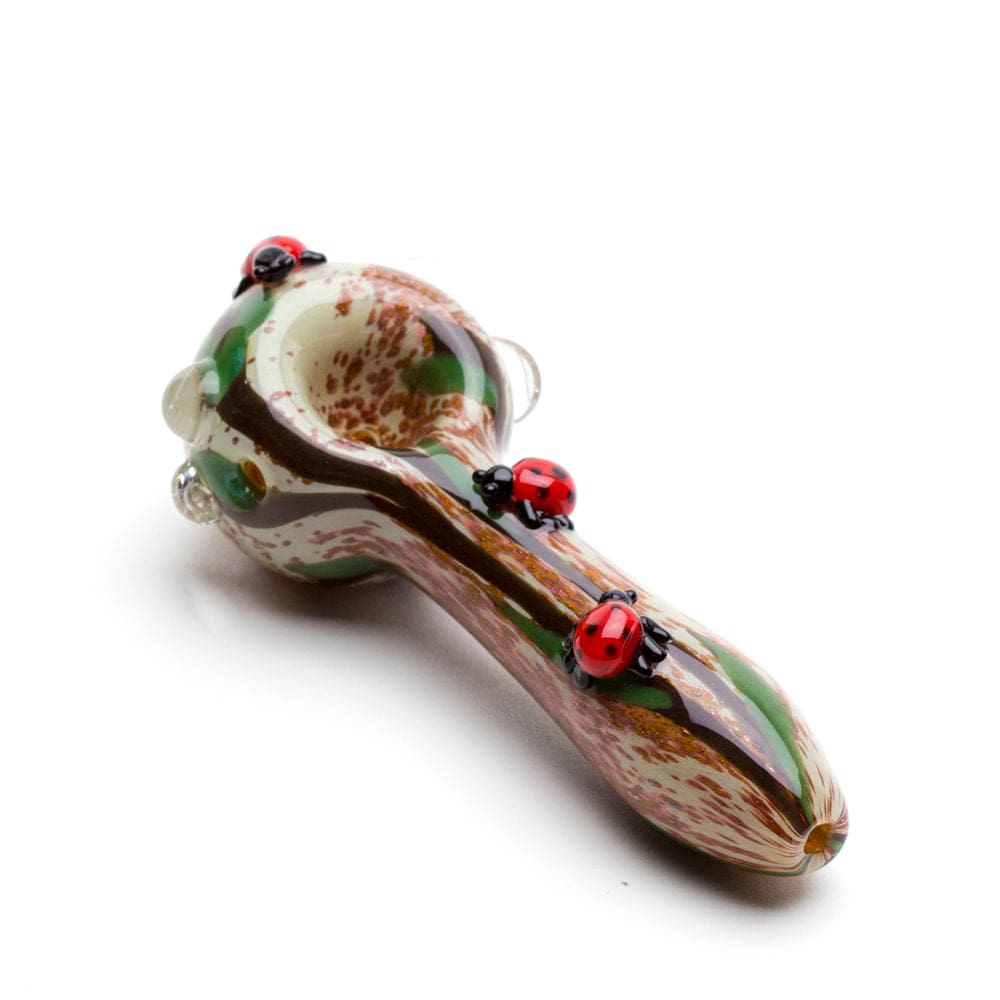 A close-up side view of the Lady Bug Mini Spoon Pipe, featuring a colorful speckled pattern and a rounded bowl.