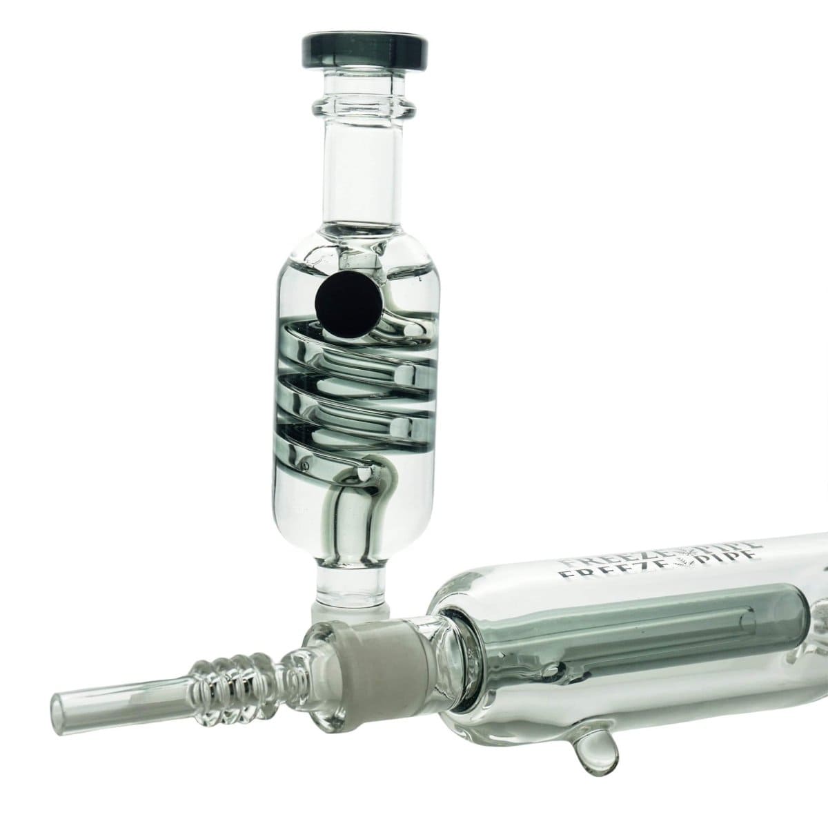 A close-up, angled view of the Freeze Pipe Nectar Collector Kit, showcasing its clear glass construction and sleek, cylindrical shape.