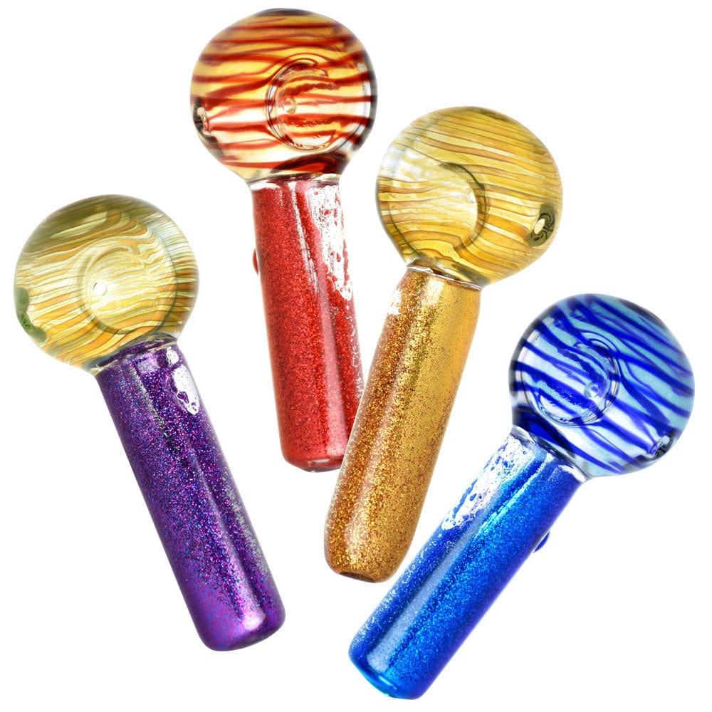 A close-up, angled view of the Freezable Glycerin Space Glitter Spoon Pipe, showcasing its colorful, sparkly design.