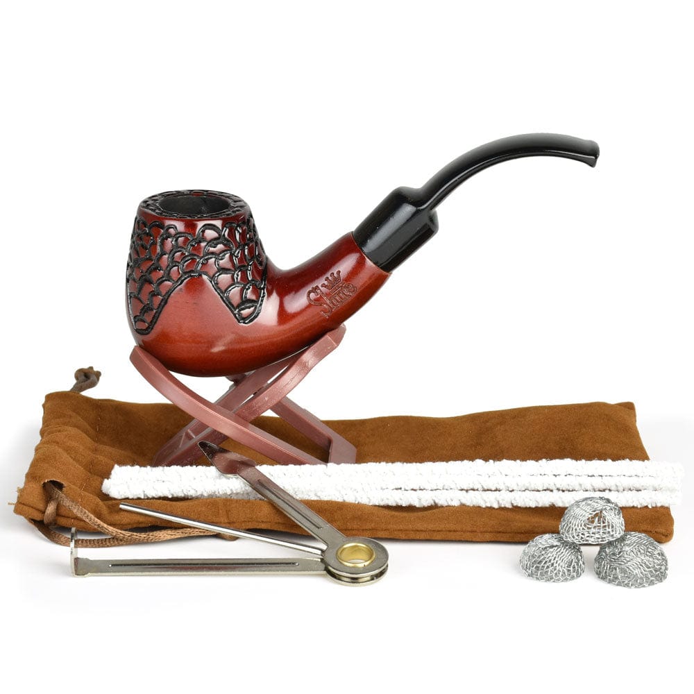 A front view of the Pulsar Shire Pipes Engraved Bent Brandy Cherry Wood pipe resting on a wooden stand, with a blurred background.