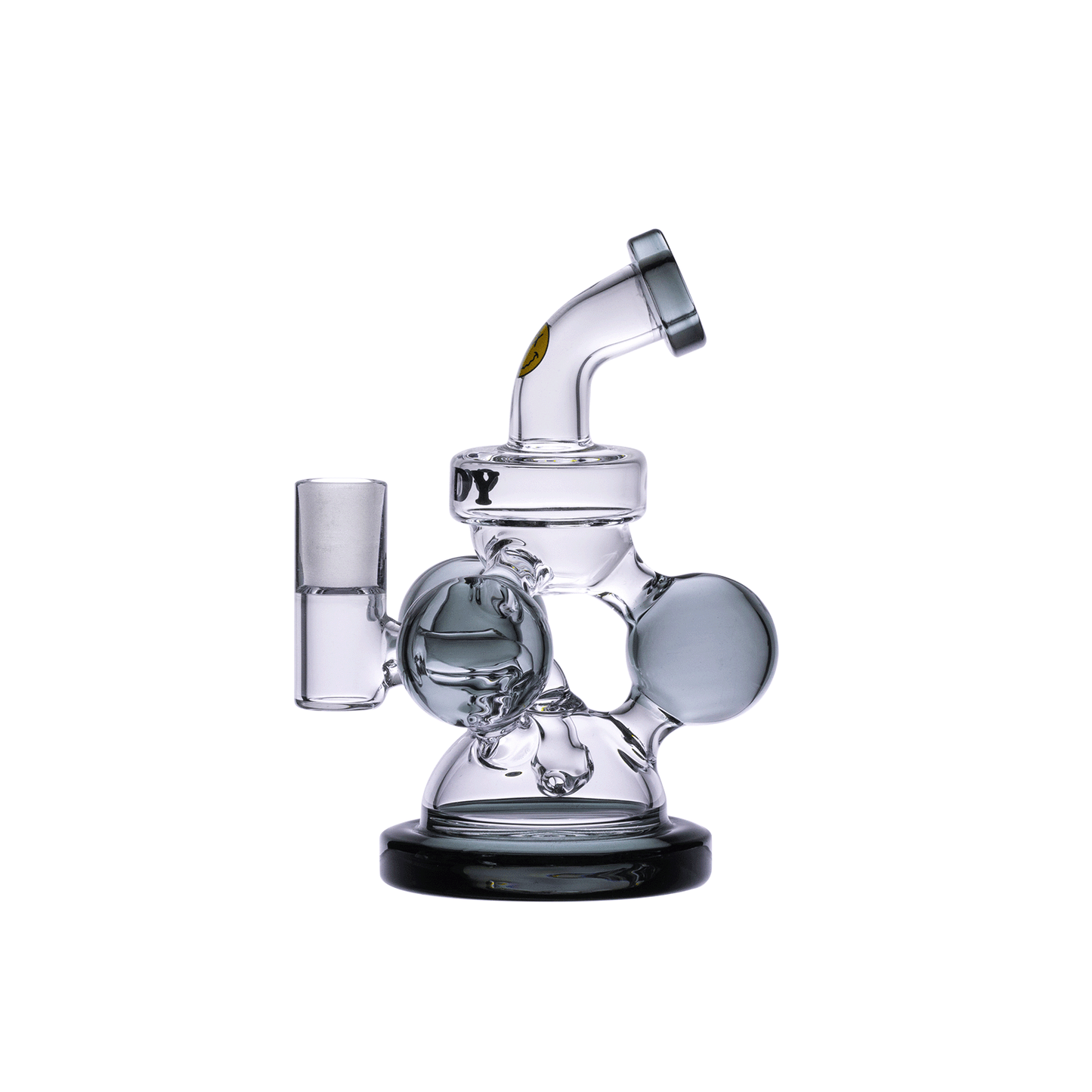 A three-quarter view of the Goody Glass - Atom Mini Dab Rig 4-Piece Kit, showcasing its compact size and clear glass construction.