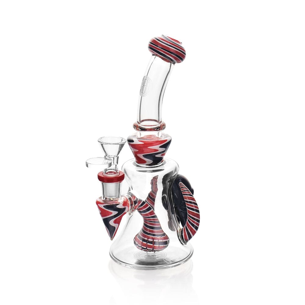 A three-quarter view of the High Society - Tulu Premium Wig Wag Concentrate Rig in red and black, showcasing its curved neck and compact design.