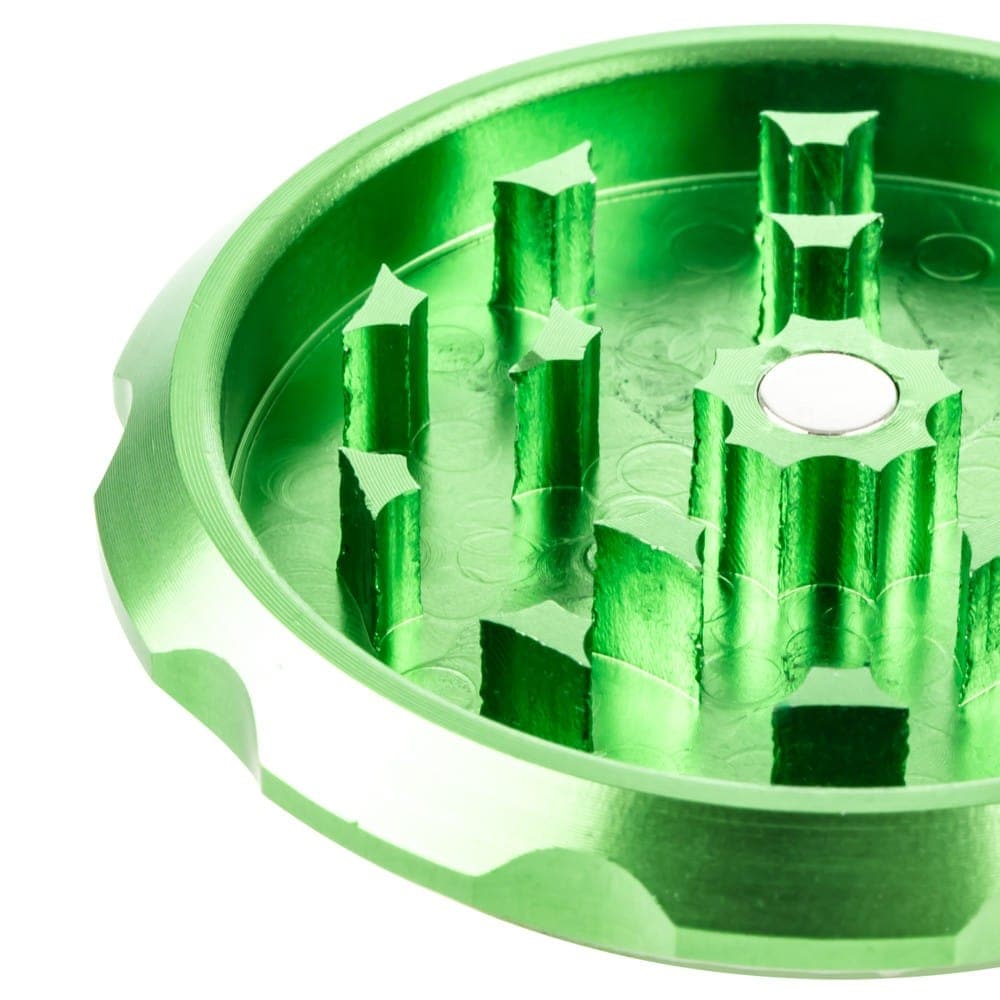 Close-up view of the Jay and Silent Bob Grinder’s interior, showcasing the metallic grinding teeth against a dark background.