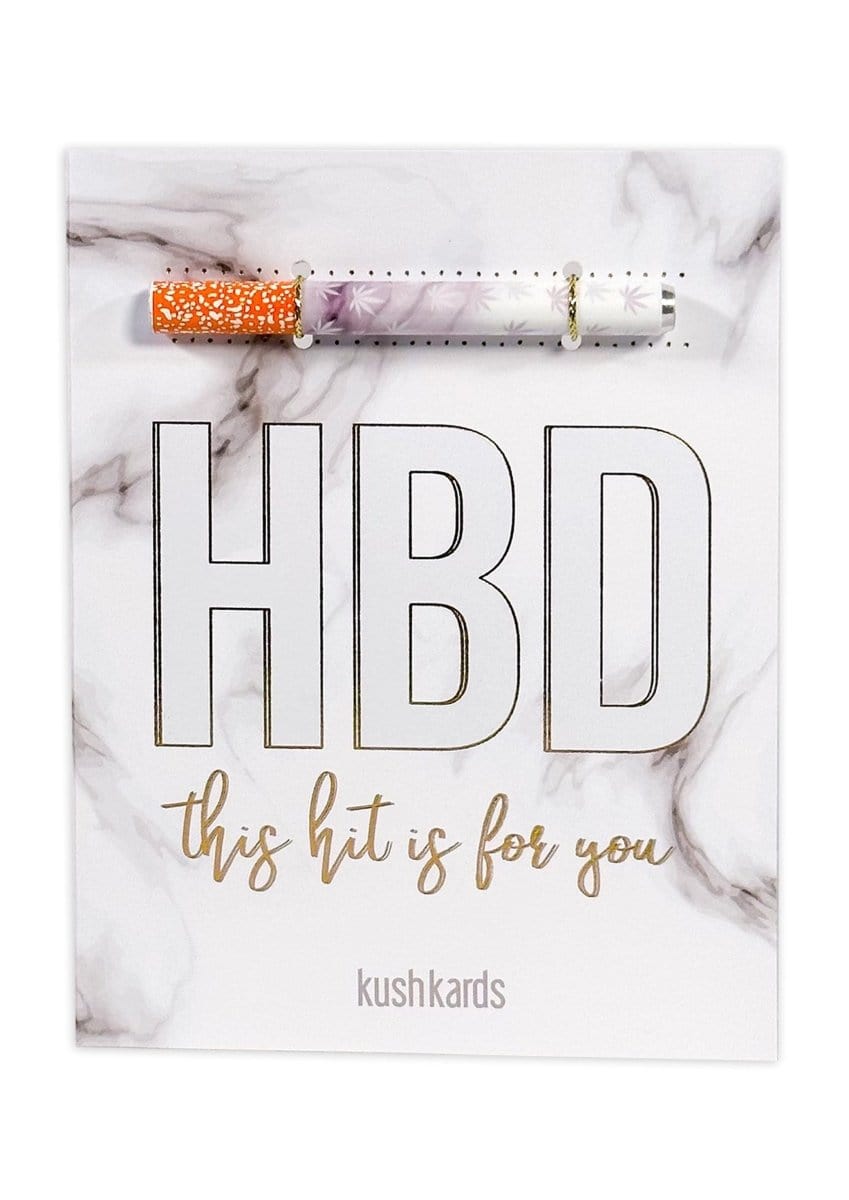 A front view of the 🍰 HBD Birthday Cannabis Greeting Card featuring bold, white lettering against a textured, light background.