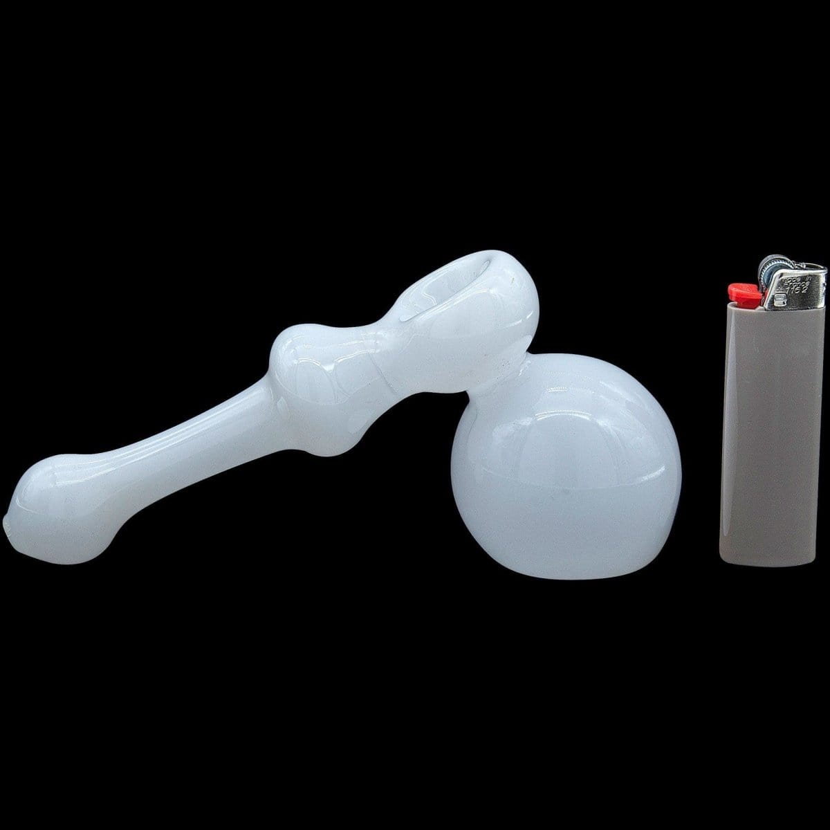 A studio shot showcases the “Ivory Hammer” Glass Hammer Bubbler Pipe against a black background, highlighting its unique curved form.