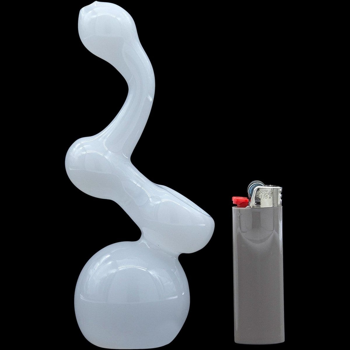 A side view of the “Ivory Sherlock” Glass Sherlock Bubbler Pipe next to a lighter, showcasing its curved design.