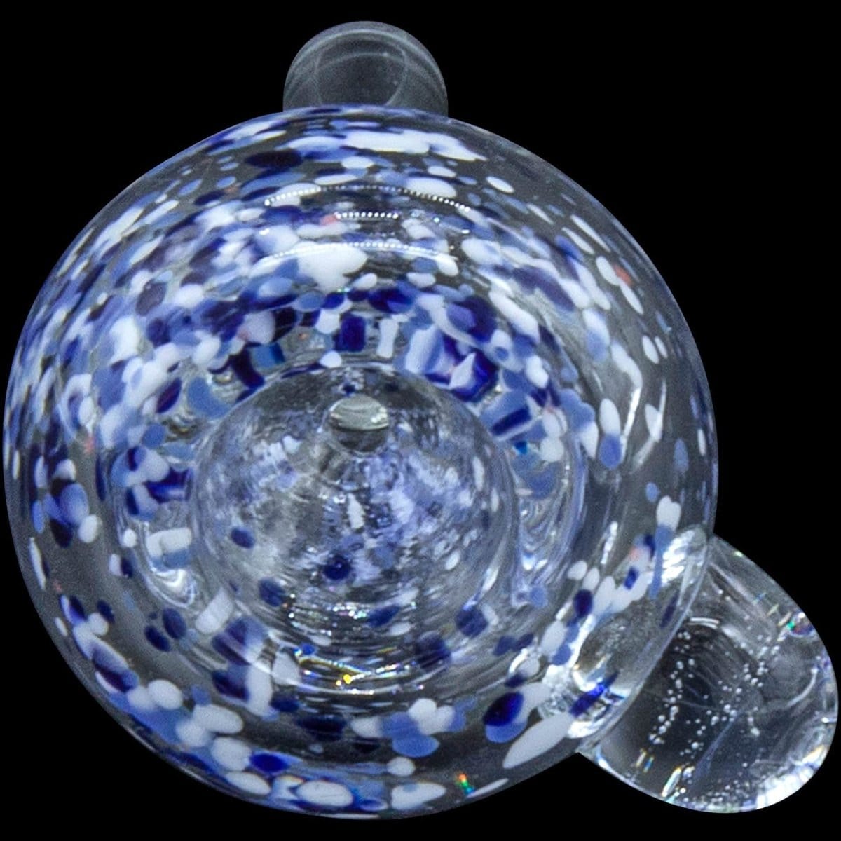 A close-up, angled view of the Frit Bubble Bowl 9mm Pull-Stem Slide, showcasing colorful frit patterns within clear glass.