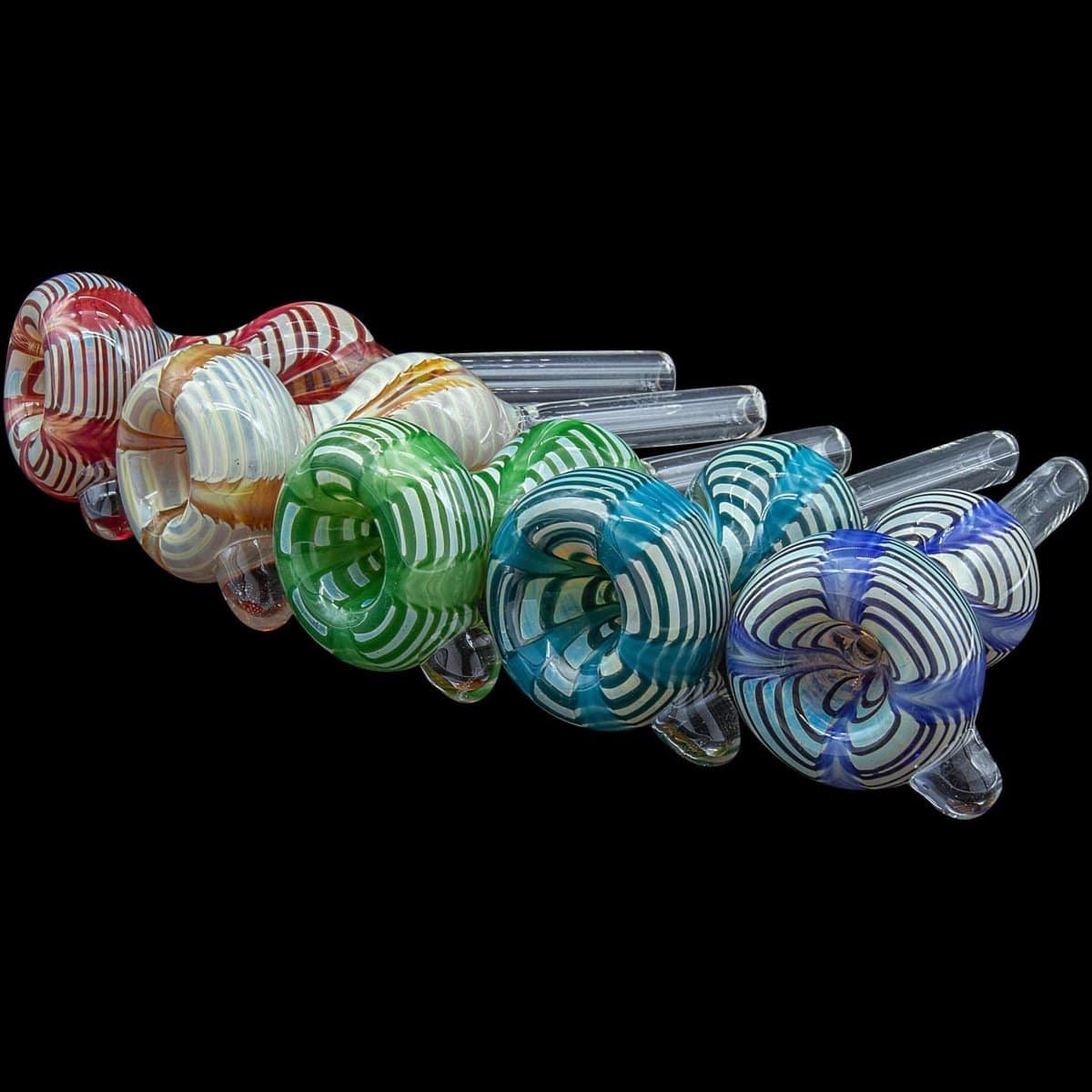 A close-up, angled view showcases the colorful Wrap-n-Rake Bubble Pull-Stem Slide Bowl, displaying a unique, swirling glass pattern.