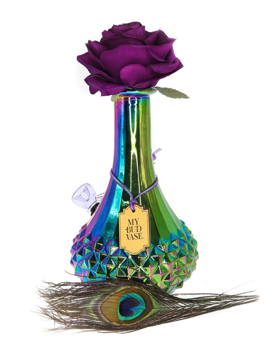 A vibrant, angled shot of the My Bud Vase "Aurora" Chrometech, featuring a purple flower emerging from its colorful glass body.