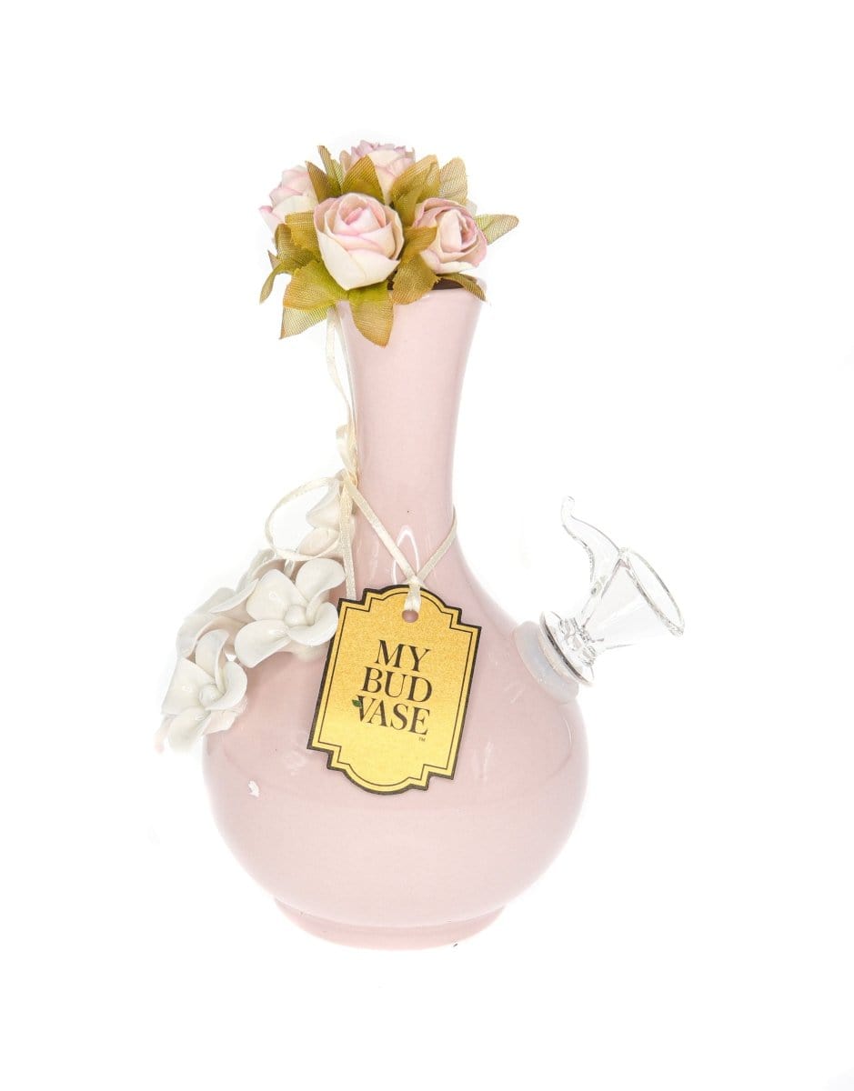 A close-up shot of the “My Bud Vase Friends” water pipe, adorned with delicate pink roses, against a plain white backdrop.