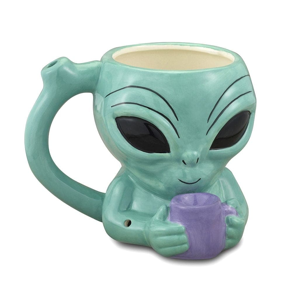 Front view of the Alien Pipe Mug, a ceramic mug shaped like an alien head with a wide opening.