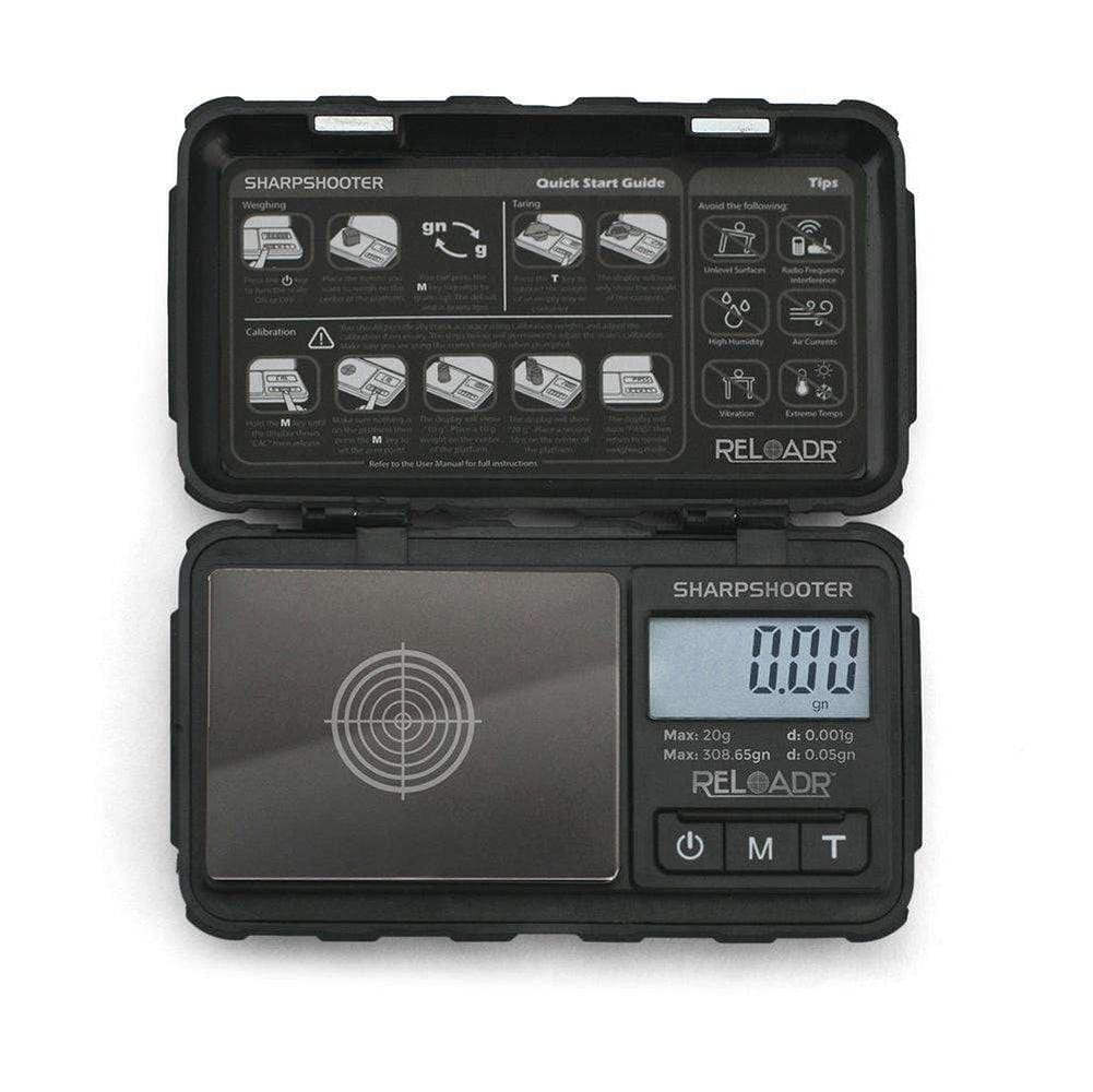 Front view of the SHARPSHOOTER Digital Reloading Scale, displaying a digital readout and calibration guide on its black surface.