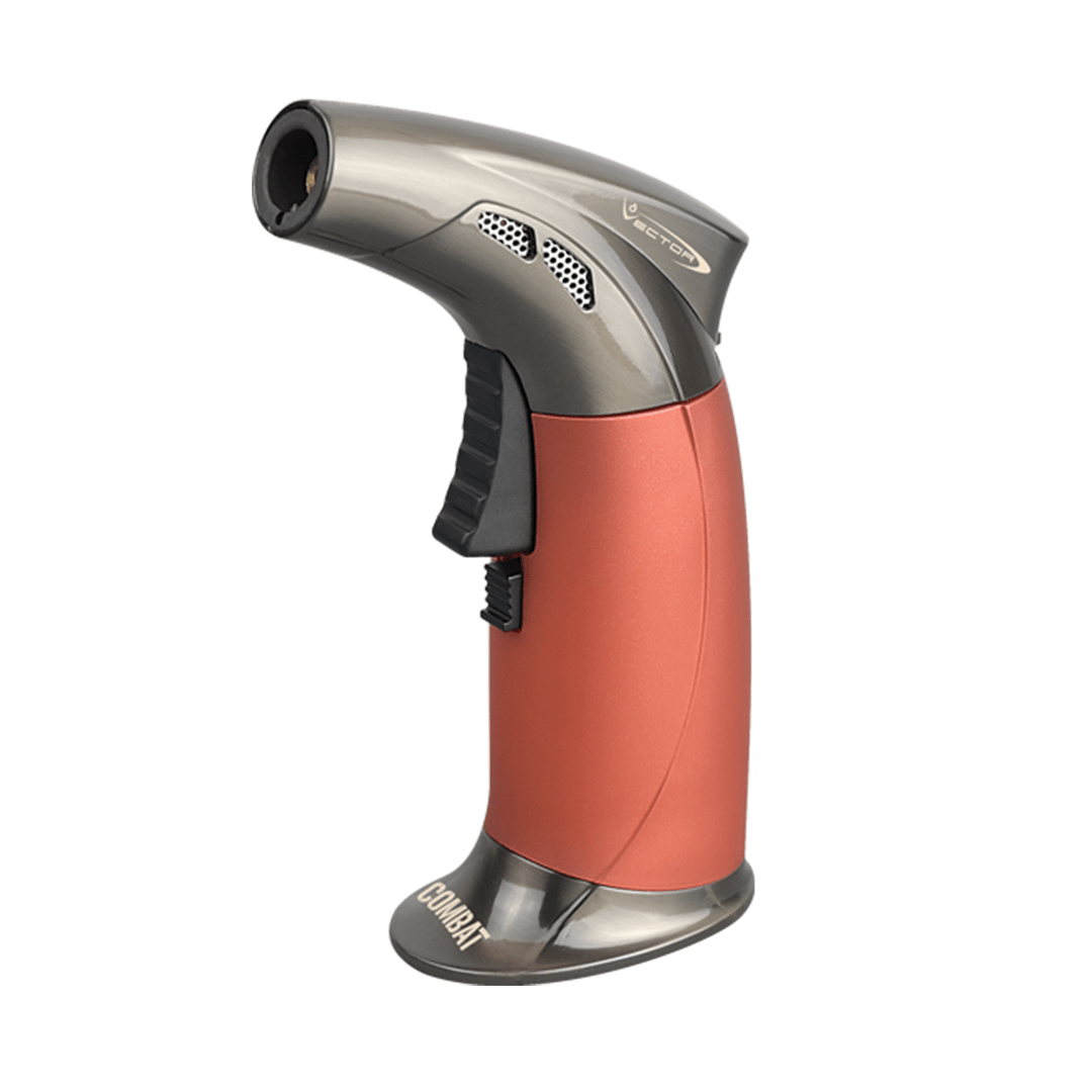 A front view of the Vector Combat Mini Torch with a silver tip and red body, angled against a plain white background.
